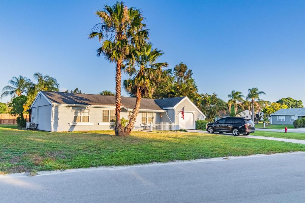 Photo of 2097 SE New York Street, Port Saint Lucie, FL 34952 (MLS # R11084643)