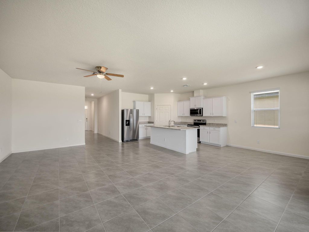 Photo of 9797 SW Triton Way, Port Saint Lucie, FL 34987 (MLS # R10986793)
