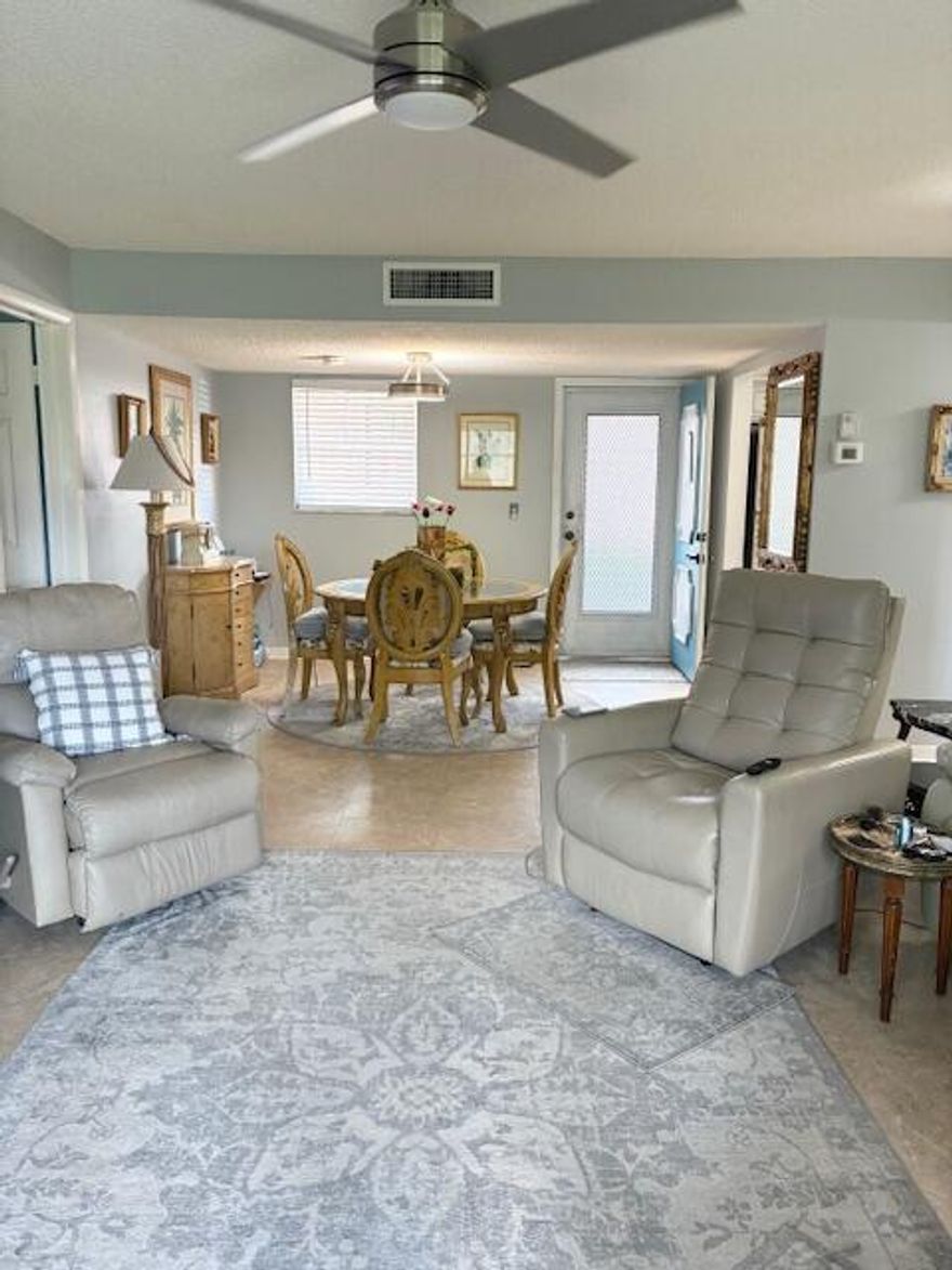Step into this beautifully remodeled 1st floor condo . Move-in ready 2-bedroom 2-full bathroom unit located in highly desirable Lakeside Village. This lovely home backs onto a peaceful canal and spacious green area - perfect for privacy and enjoying nature right from your balcony. Brand new A/c and hot water heater recently installed.Amenities included are Two sparkling swimming pools, state of the art fitness center, billiards and recreation room, picnic area and much more. Come see this beautifully maintained condo and start the Lakeside Village Lifestyle today.Centrally located to shopping, I 95, PBI airport, and only minutes to the beach.No smoking or Pets as per owner request!