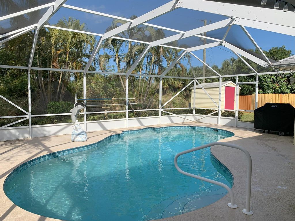Photo of 875 SE Carnival Avenue, Port Saint Lucie, FL 34983 (MLS # R11043997)