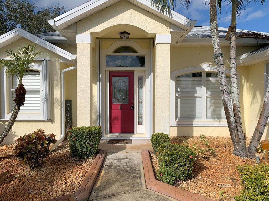 Photo of 875 SE Carnival Avenue, Port Saint Lucie, FL 34983 (MLS # R11043997)