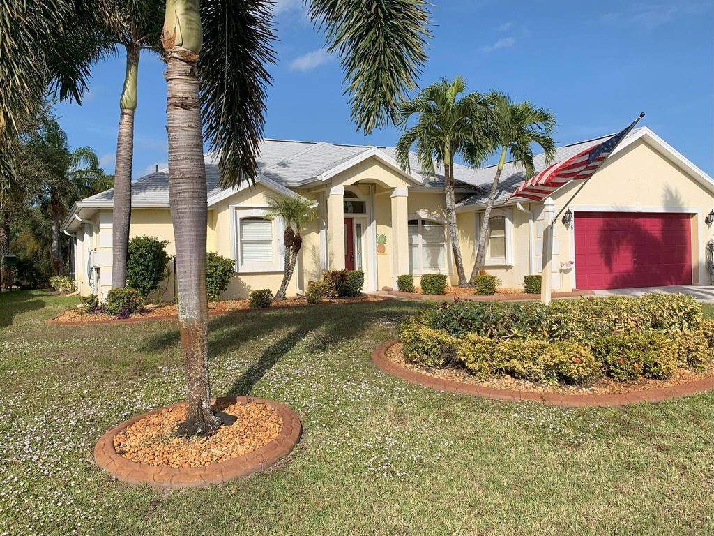 Photo of 875 SE Carnival Avenue, Port Saint Lucie, FL 34983 (MLS # R11043997)