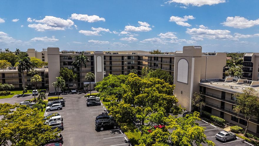 STUNNING WATER VIEWS! Rare private end-unit overlooking the Hillsboro Canal, offering sweeping water vistas through wraparound windows and a screened balcony. This light-filled 2-bedroom, 2-bath residence features a desirable split-bedroom layout and is ideally located just steps from one of the community's heated pools. Situated in the highly sought-after Boca Bayou, a 24-hour manned gated waterfront community, residents enjoy resort-style amenities including five heated saltwater pools, tennis courts, fitness centers, clubhouse, boat docks (available for rent), and beautifully landscaped grounds with scenic waterways throughout. The association has completed its 30-year concrete recertification (Milestone Inspection) and Structural Integrity Reserve Study (SIRS), with ongoing clubhouse  renovations enhancing the community even further. All assessments have been paid—no additional cost to the buyer. Maintenance includes building insurance, water, cable with HBO, security, reserves, and full access to amenities. Ideally located in Southeast Boca Raton, just minutes from pristine beaches, Mizner Park, Royal Palm Place, and Hillsboro El Rio Park with pickleball and outdoor recreation. Experience exceptional waterfront living in one of Boca Raton's most desirable gated communities.