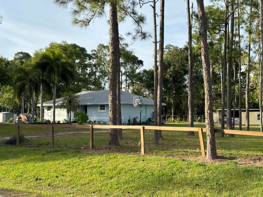 Photo of 12809 53rd Road N, Royal Palm Beach, FL 33411 (MLS # R10860211)