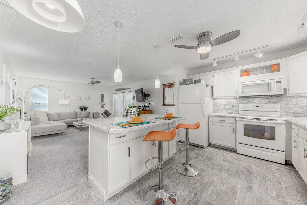 Photo of 6531 SE Federal Highway #S-201, Stuart, FL 34997 (MLS # R10965029)