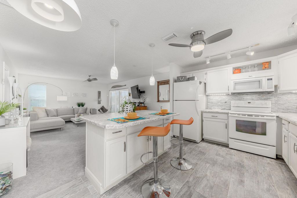 Photo of 6531 SE Federal Highway #S-201, Stuart, FL 34997 (MLS # R10965029)