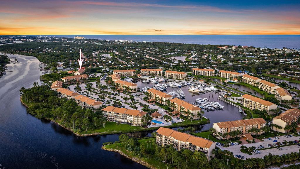 Photo of 1701 Marina Isle Way #202, Jupiter, FL 33477 (MLS # R11164504)