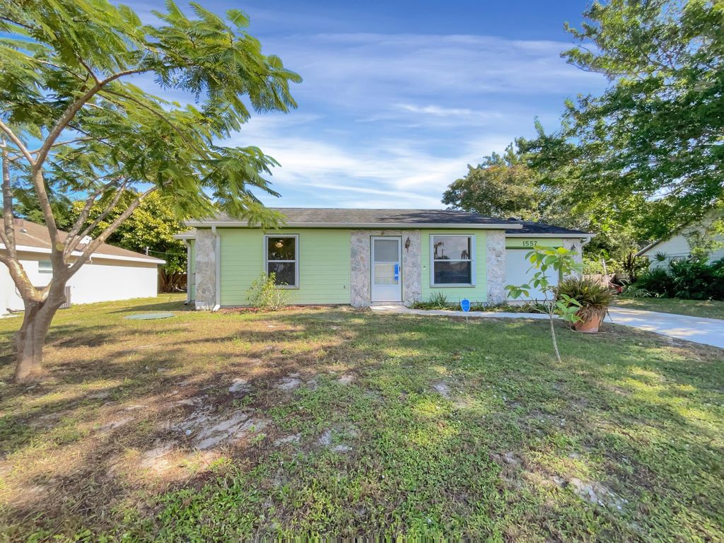 Photo of 1557 SE Clearbrook Street, Port Saint Lucie, FL 34983 (MLS # R10933732)