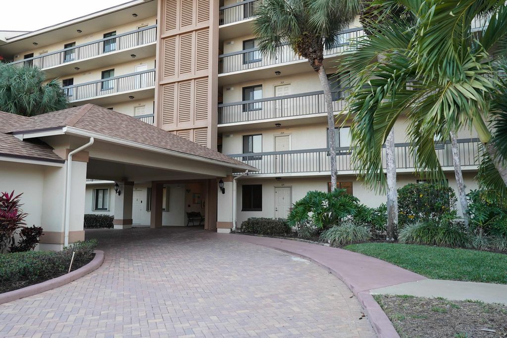 Photo of 2101 Marina Isle Way #104, Jupiter, FL 33477 (MLS # R11164871)