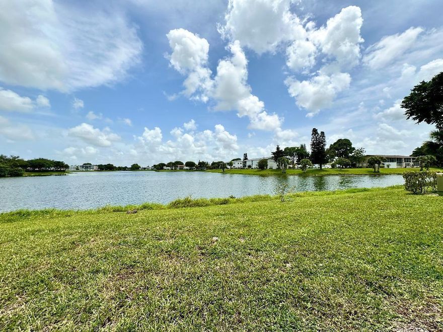 A Fantastic Price AND Gorgeous Wide Water Views in 55+ Century Village! Rarely Available FIRST FLOOR 1/1.5 With Some of the Best Views in Century Village. Neutral Tile Flooring Flows Throughout. Updated Baths. Central AC. Spacious Water View Bedroom Suite With Updated Full Ensuite Bath, Wall of Closets, and Access to the Screened Lanai. Fantastic Central Location Close to Hastings Fitness Center AND The Main Clubhouse. Century Village is a 55+ Resort Style community with so much to offer...