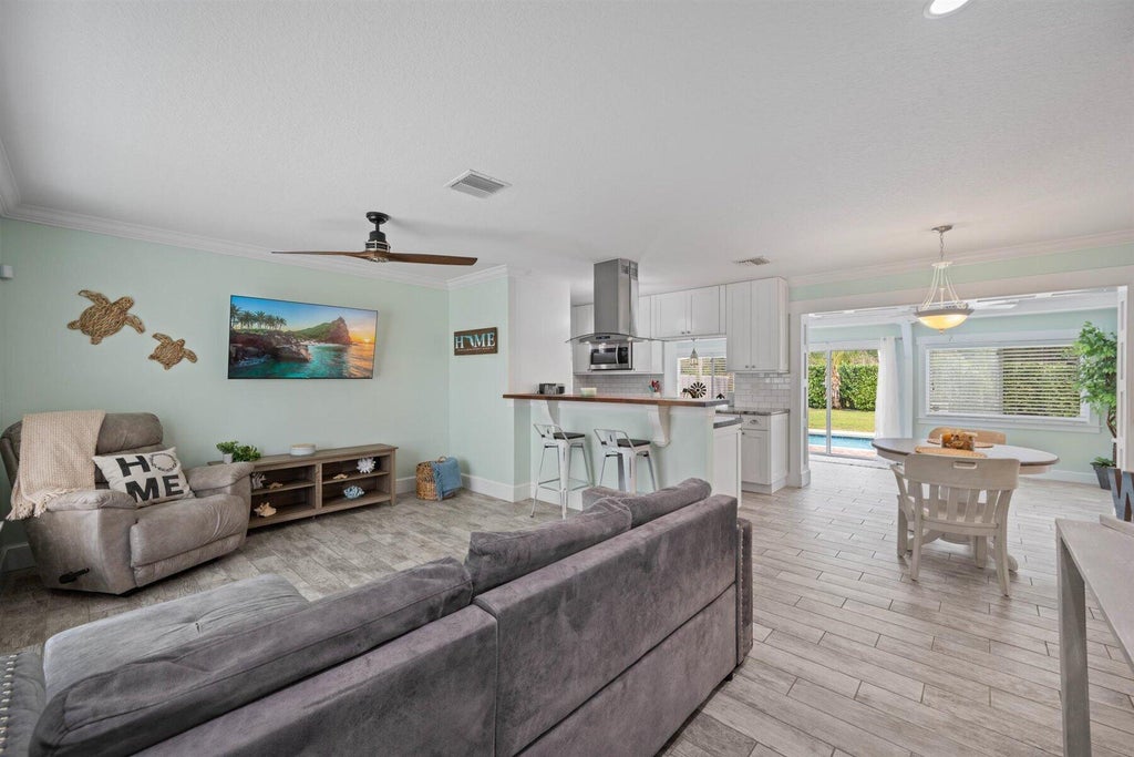 Photo of 261 SW Lucero Drive, Port Saint Lucie, FL 34983 (MLS # R10958947)