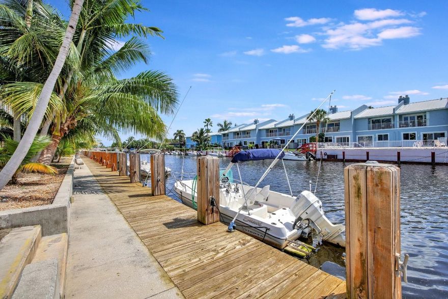 CHARMING 2 BR/ 2 BA HOME WITH STYLISH UPGRADES & BOAT DOCKAGE!Step into this beautifully remodeled 2br/2ba home, featuring a timeless update to the kitchen and bathrooms. The hard surface floors make it easy to clean up after your beach adventures, with the shore & Pompano Pier just 3.5 miles away. Unwind on the screened balcony, offering serene views &. direct access to the sparkling pool. Boat dockage is available for boating enthusiasts making it easy to take full advantage of the waterfront lifestyle. The spacious master bedroom includes a large walk-in closet, offering ample storage for your wardrobe. With two full bedrooms and bathrooms, its's ideal for hosting guests or a growing family. One assigned parking space. Laundry facilities onsite. Your first-floor sanctuary awaits.