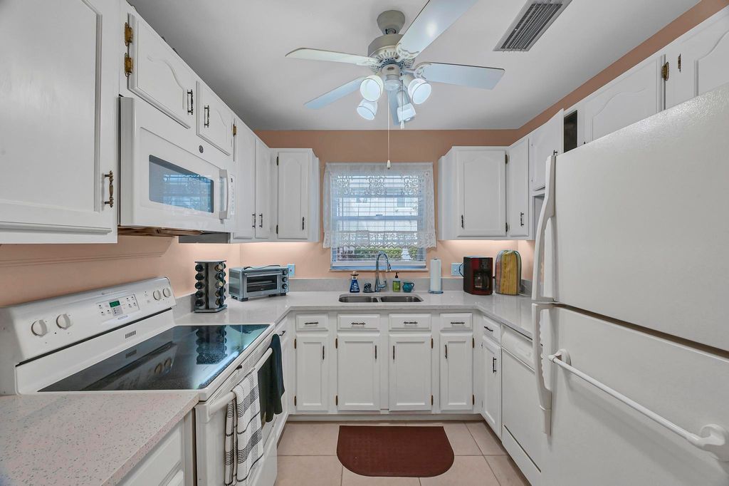 Photo of 25 Lake Vista Trail #102, Port Saint Lucie, FL 34952 (MLS # R11023774)