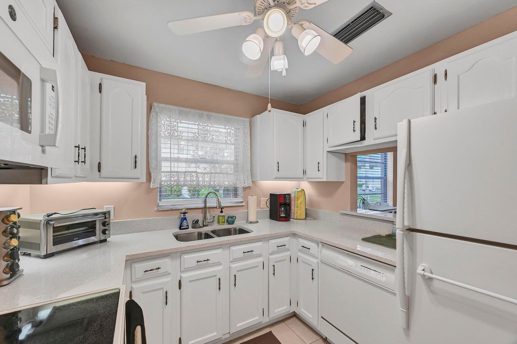 Photo of 25 Lake Vista Trail #102, Port Saint Lucie, FL 34952 (MLS # R11023774)