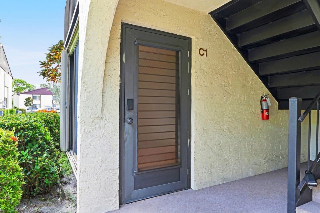 Photo of 314 Knotty Pine Circle #C-1, Greenacres, FL 33463 (MLS # B26070876)