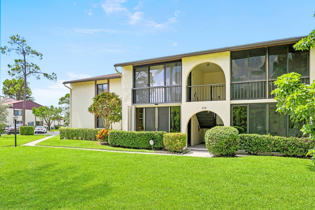 Photo of 314 Knotty Pine Circle #C-1, Greenacres, FL 33463 (MLS # B26070876)