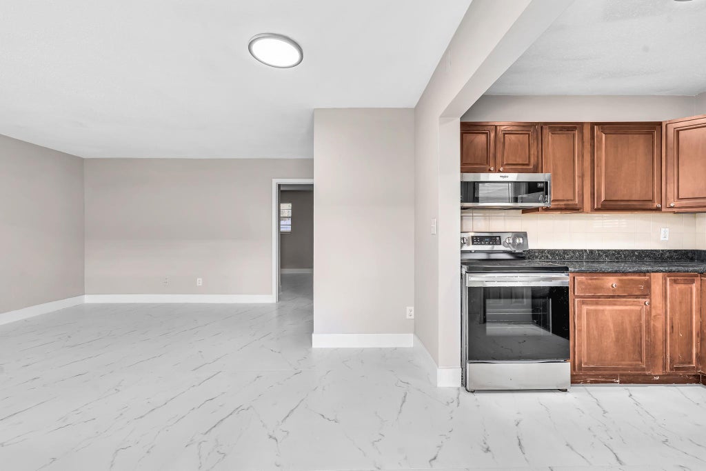 Photo of 626 SW 14TH Avenue #102, Fort Lauderdale, FL 33312 (MLS # B26064440)