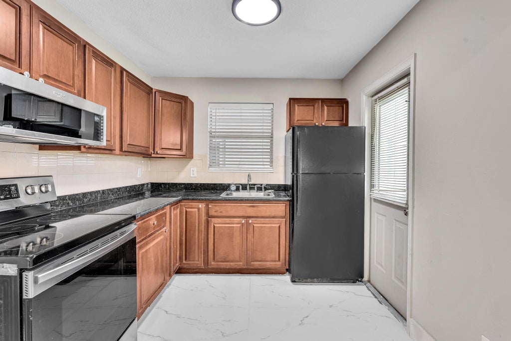 Photo of 626 SW 14TH Avenue #102, Fort Lauderdale, FL 33312 (MLS # B26064440)