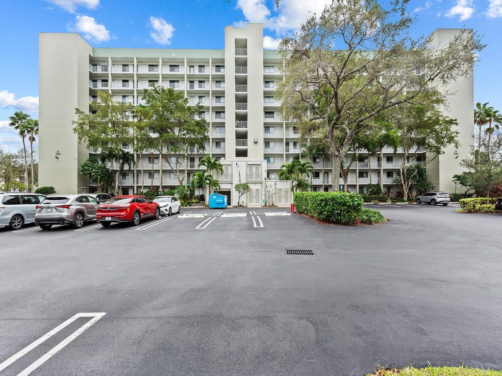 Photo of 2240 N Cypress Bend Drive #105, Pompano Beach, FL 33069 (MLS # F10419471)