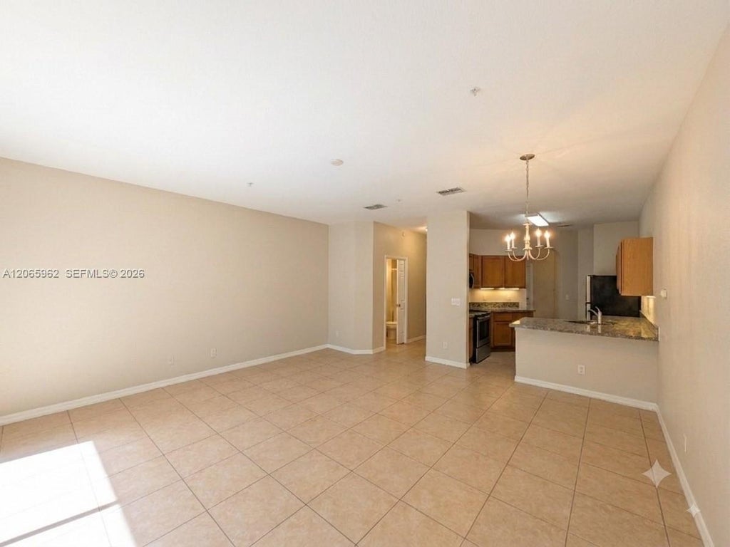 Photo of 911 Pipers Cay Drive #52, West Palm Beach, FL 33415 (MLS # A12065962)