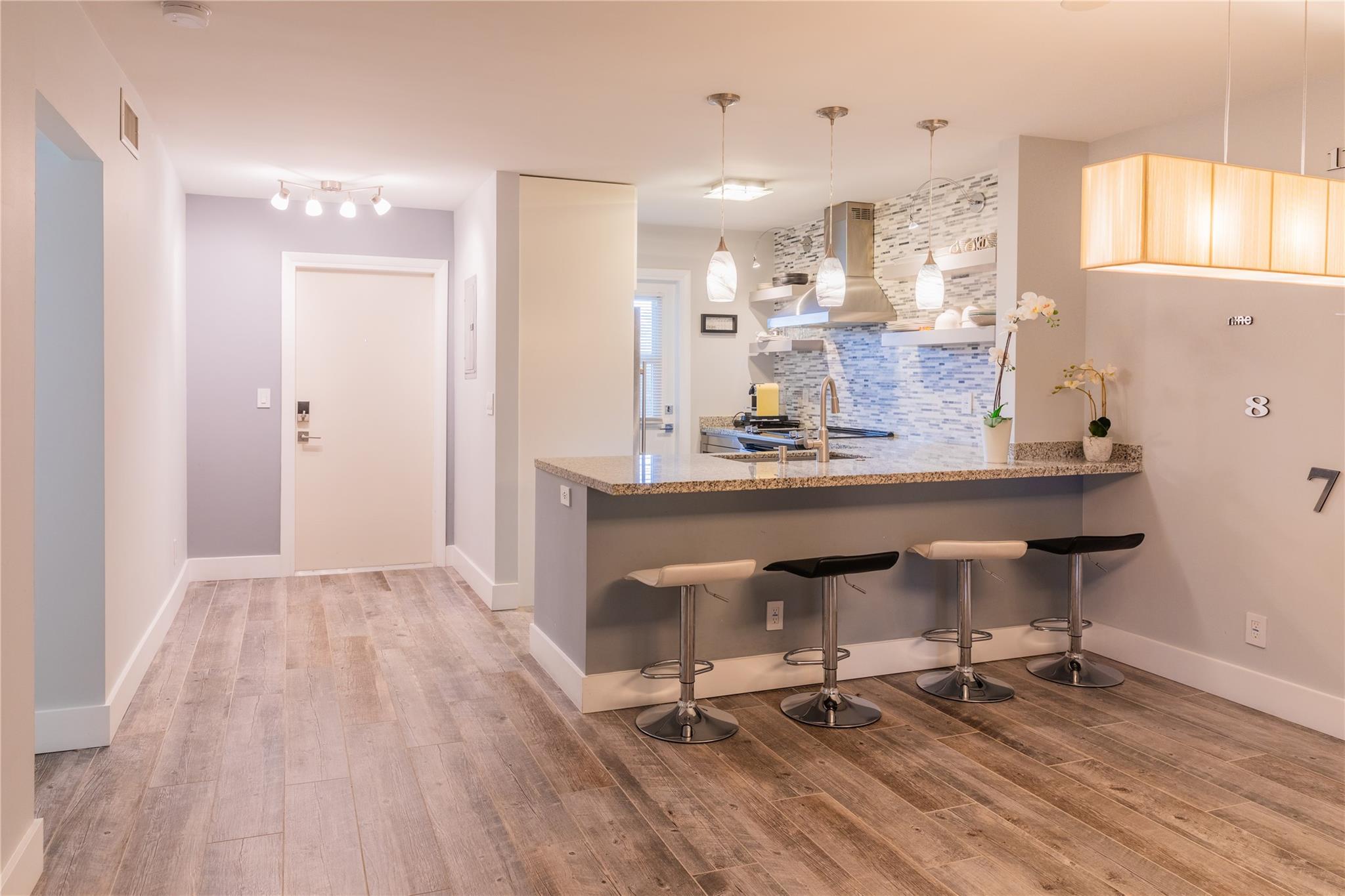 ALL ASSESSMENTS PAID. Fully remodeled 2BR/2BA condo with clean, modern finishes and impact windows throughout. Located in the heart of everythingjust minutes to beaches, dining, shopping, hospitals, and medical offices. This bright and spacious unit offers an open layout, updated kitchen and baths, private balcony, and plenty of natural light as back of unit faces south. The well-maintained building features elevator access and includes one assigned parking space. Residents enjoy a large sparkling pool, sauna, and card room. Easy to show.