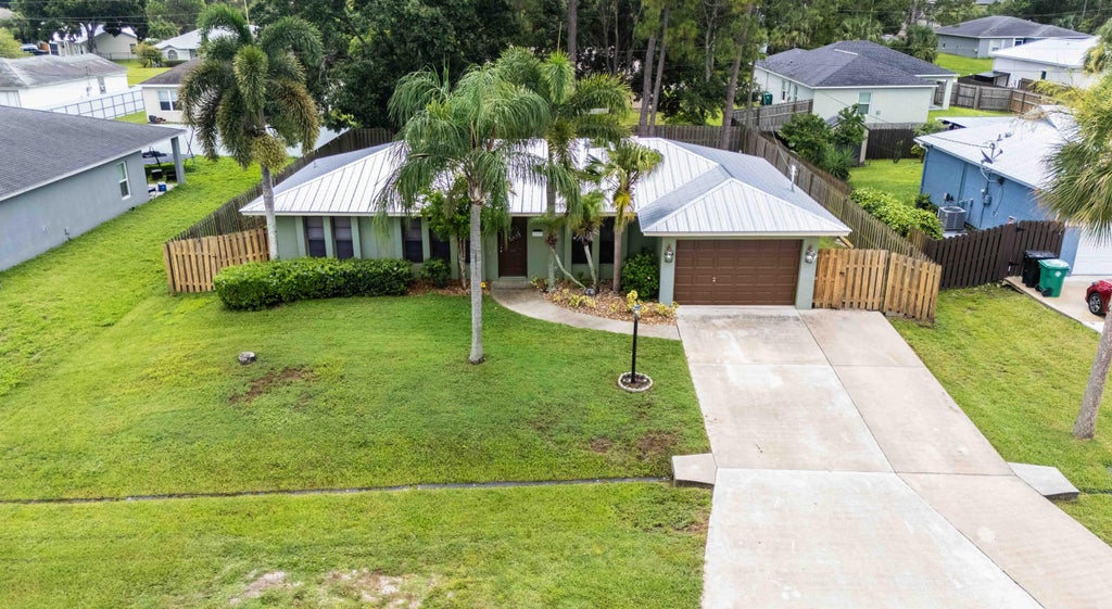 Photo of 2449 SW Roney Road, Port Saint Lucie, FL 34953 (MLS # R11108034)