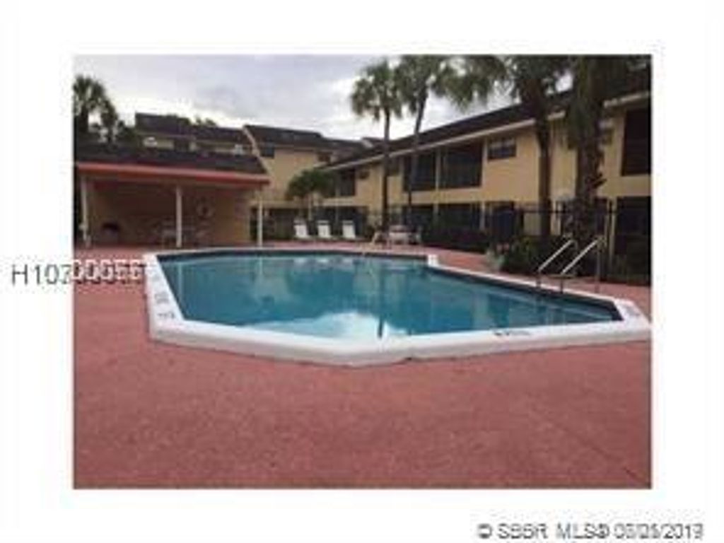 Photo of 3005 Riverside Dr Dr #114, Coral Springs, FL 33065 (MLS # F10347699)