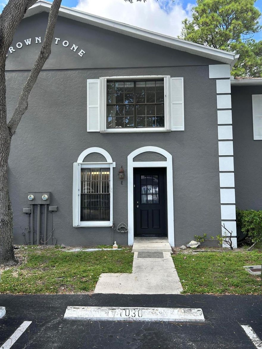 Look no further to make this 2 bed and 2.5 bath home yours!!Freshly Painted with a great LAKEVIEW , some fruit trees in the back yard!! Updated flooring and vanities in bathroom with new Counter top in the kitchen. Accordion shutters in full house .