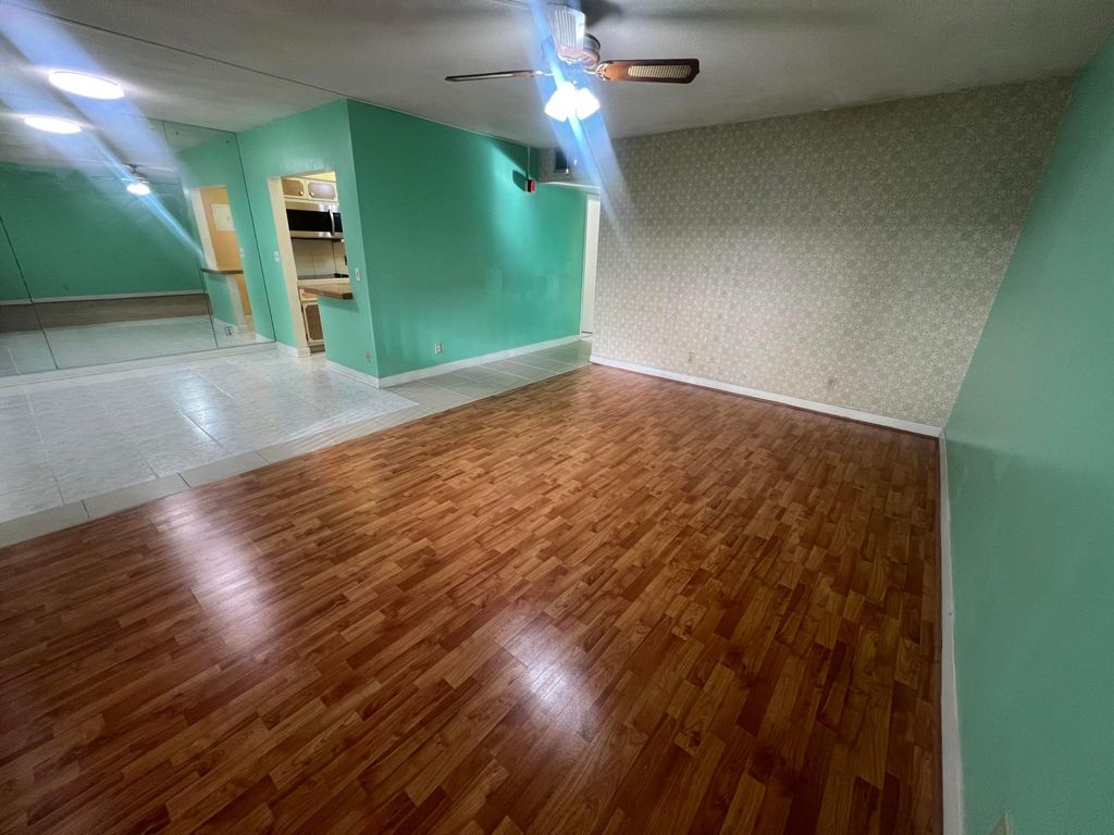 Photo of 3071 NW 47th Terrace #125, Lauderdale Lakes, FL 33313 (MLS # B26037629)