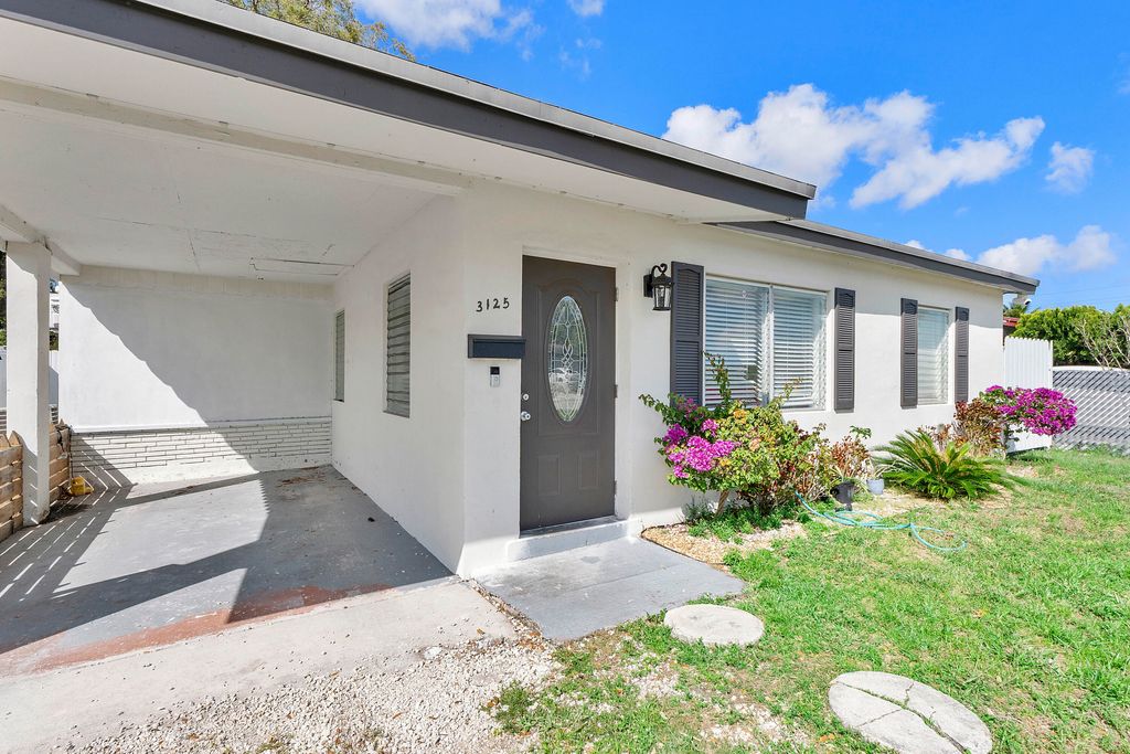 Photo of 3125 SW 12th Place, Fort Lauderdale, FL 33312 (MLS # B26003159)