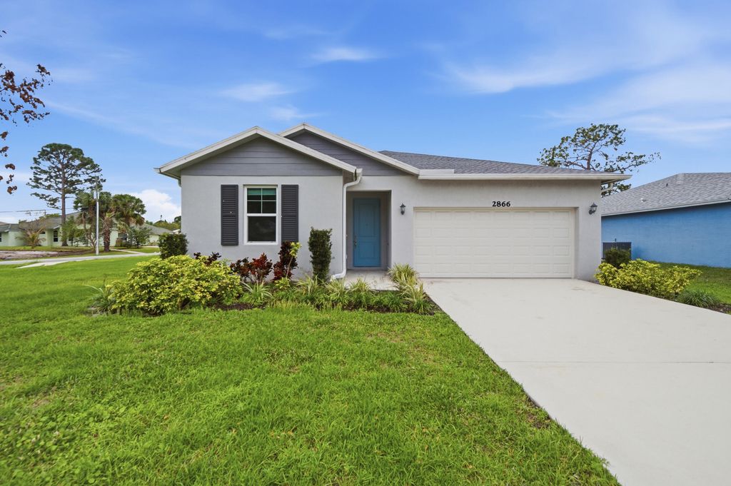 Photo of 2866 SW Rosetta Street, Port Saint Lucie, FL 34953 (MLS # B26003015)