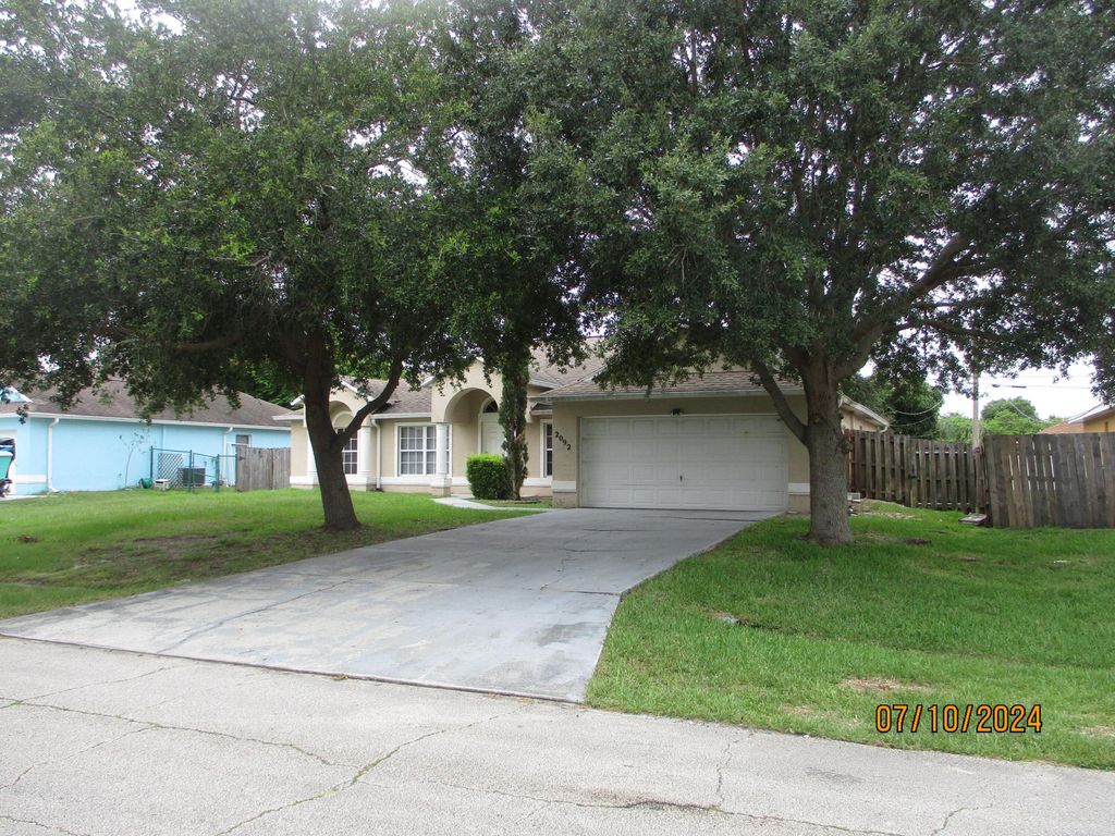 Photo of 2092 SW Pruitt Street, Port Saint Lucie, FL 34953 (MLS # R11009273)