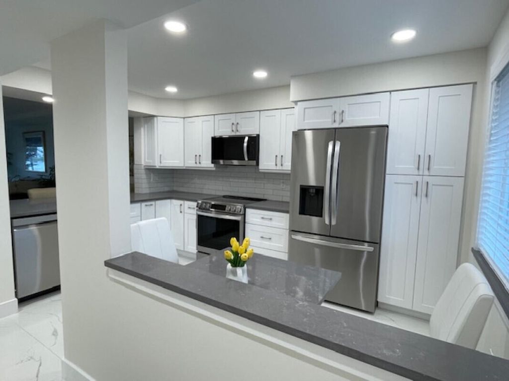 Photo of 14111 Royal Vista Drive #109, Delray Beach, FL 33484 (MLS # B26043030)