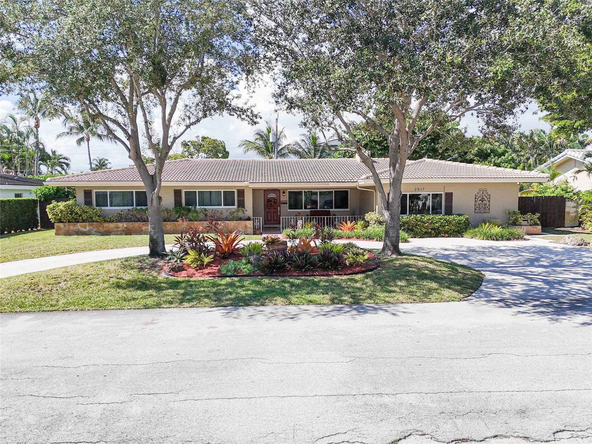 Don’t miss this incredible opportunity to own a home in the prestigious Coral Ridge community part of the Bayview School District! Lovingly maintained by the same owners for over 30 years, this home reflects pride of ownership and offers a rare chance to bring your personal vision to life while building instant equity. Featuring 4 spacious bedrooms and 3 full bathrooms, on almost 10,000 sqft. Featuring two primary suites on opposite sides of the home, perfect for privacy, guests, or multigenerational living. Enjoy peace of mind with ALL IMPACT WINDOWS AND DOORS & step outside into a massive backyard retreat with a pool, lush landscaping, and endless room for entertaining or expanding. With gorgeous curb appeal, a well designed layout, this property is a true gem.