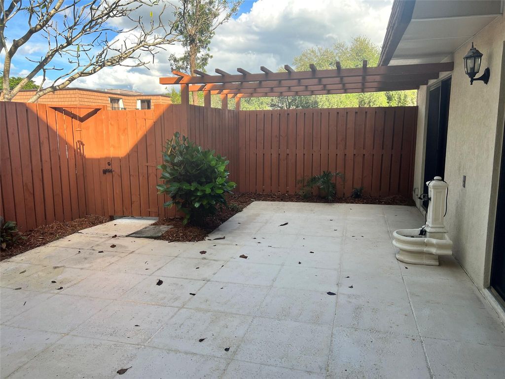 Photo of 9101 SW 19th Pl #B, Davie, FL 33324 (MLS # F10540503)