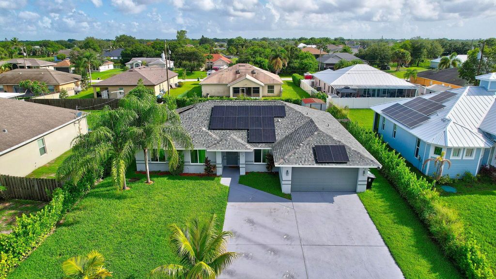 Photo of 423 SW Leona Drive, Port Saint Lucie, FL 34953 (MLS # R11001348)