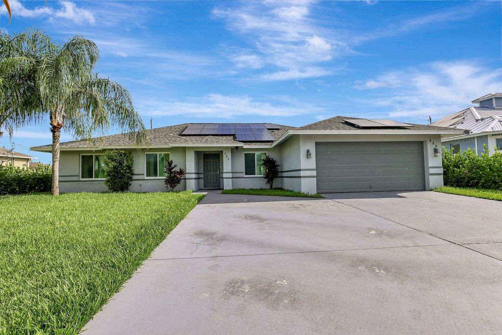 Photo of 423 SW Leona Drive, Port Saint Lucie, FL 34953 (MLS # R11001348)