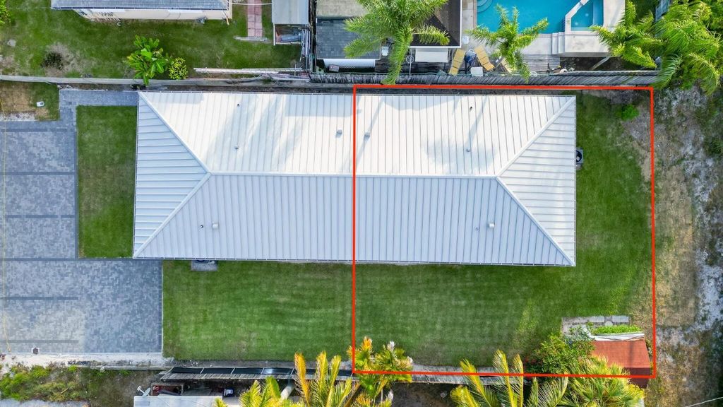 Photo of 305 De Carie Street, Delray Beach, FL 33444 (MLS # R11073189)