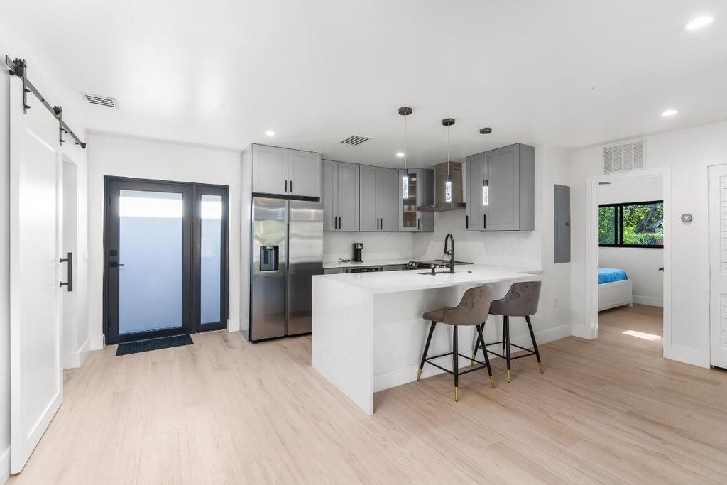 Photo of 305 De Carie Street, Delray Beach, FL 33444 (MLS # R11073189)
