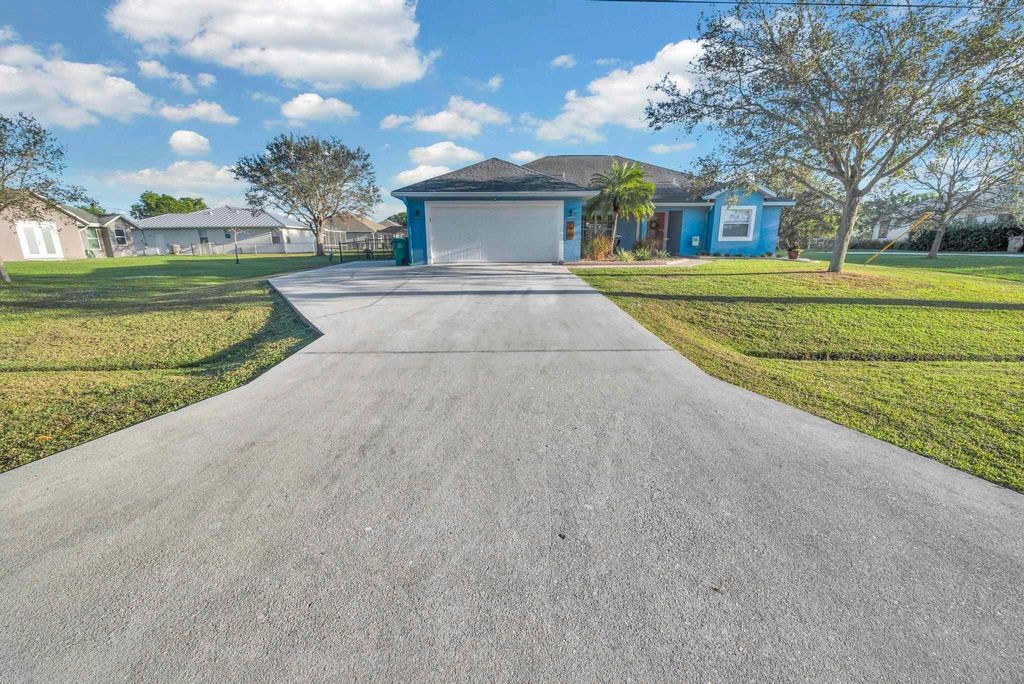 Photo of 5464 NW Milner Drive, Port Saint Lucie, FL 34983 (MLS # R11126376)