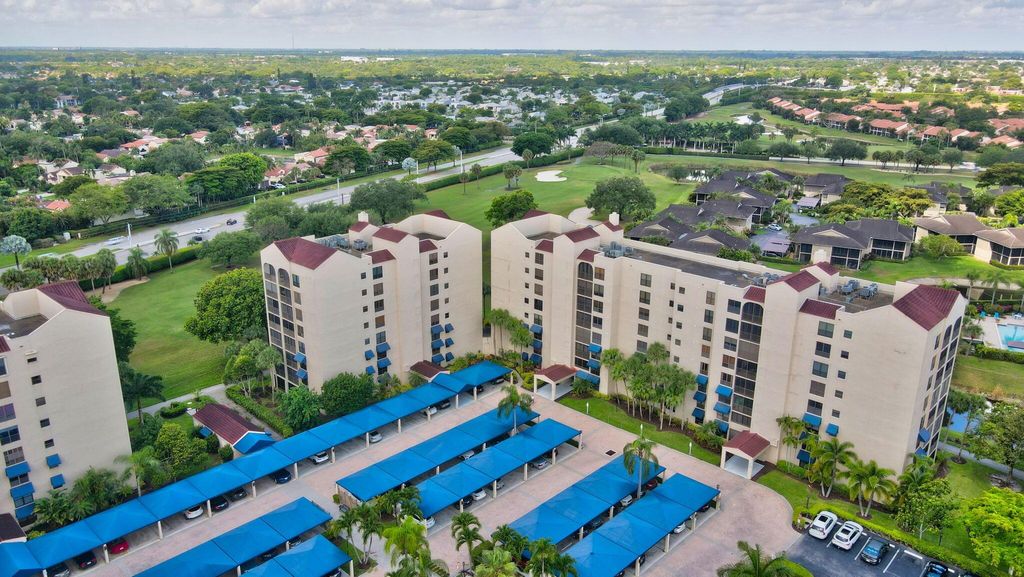 Photo of 7578 Regency Lake Drive #801, Boca Raton, FL 33433 (MLS # R11134233)