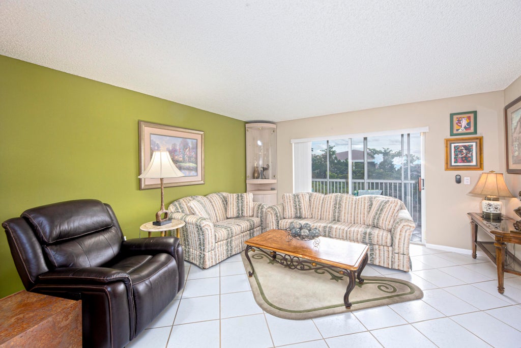 Photo of 9511 Weldon Circle #G416, Tamarac, FL 33321 (MLS # B26083436)