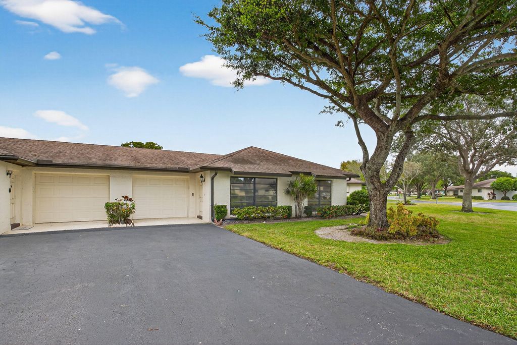 Photo of 10397 Equestrian Drive #B, Boynton Beach, FL 33436 (MLS # R11160897)