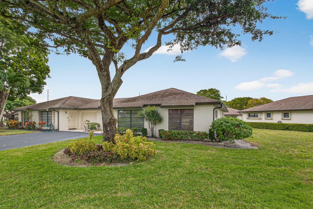 Photo of 10397 Equestrian Drive #B, Boynton Beach, FL 33436 (MLS # R11160897)