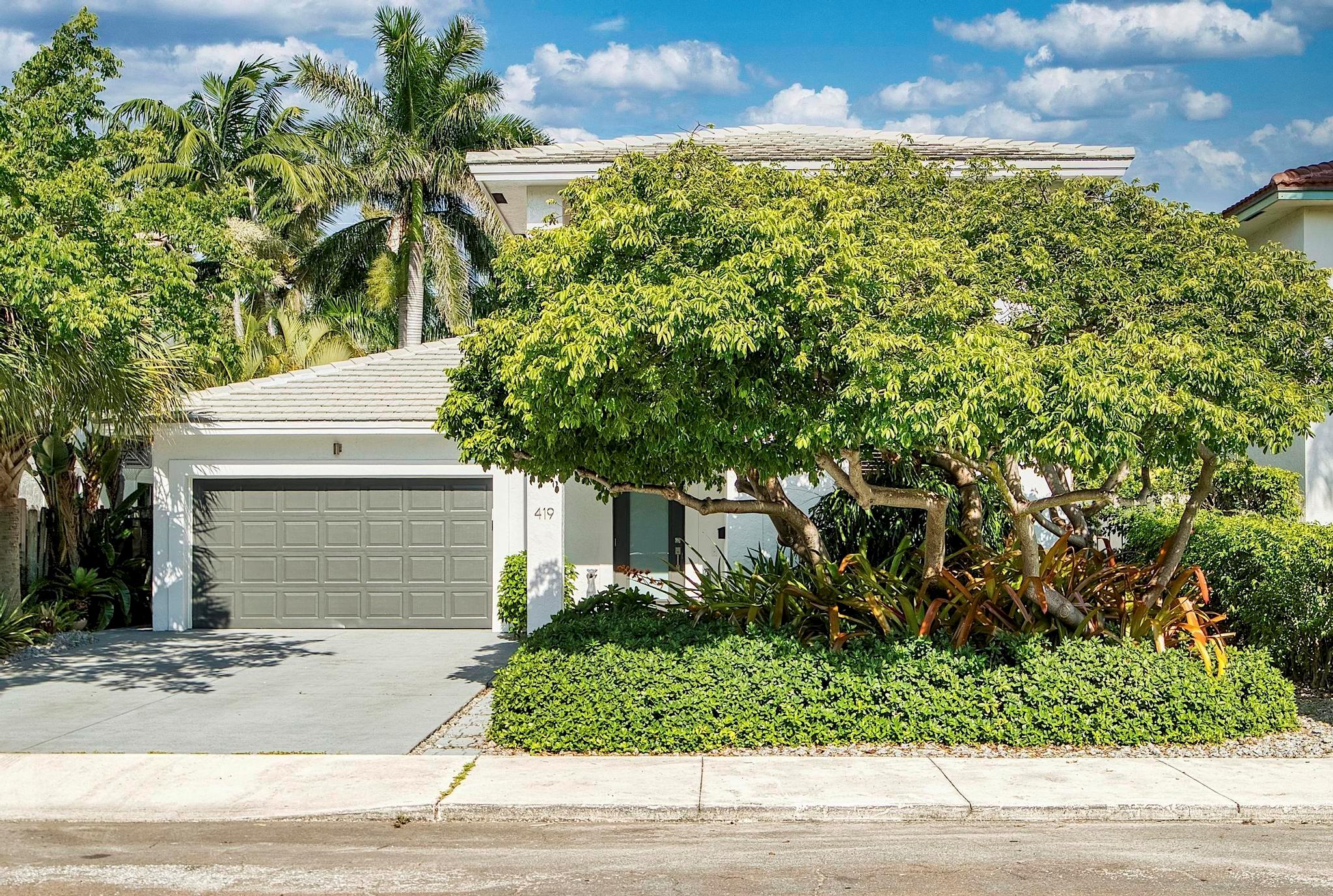 This handsome 3-bedroom, 3-bath pool home in Parrot Cove will make you smile. This home is beautiful, big, and located in the perfect spot. From the flooring and newer kitchen to the large patio and master suite on the ground floor, yes, a 2-car garage and a driveway will accommodate all your vehicles. Blocks away from downtown, the golf course and bridge to the beach. The pool area is just spot on and landscaped to perfection.