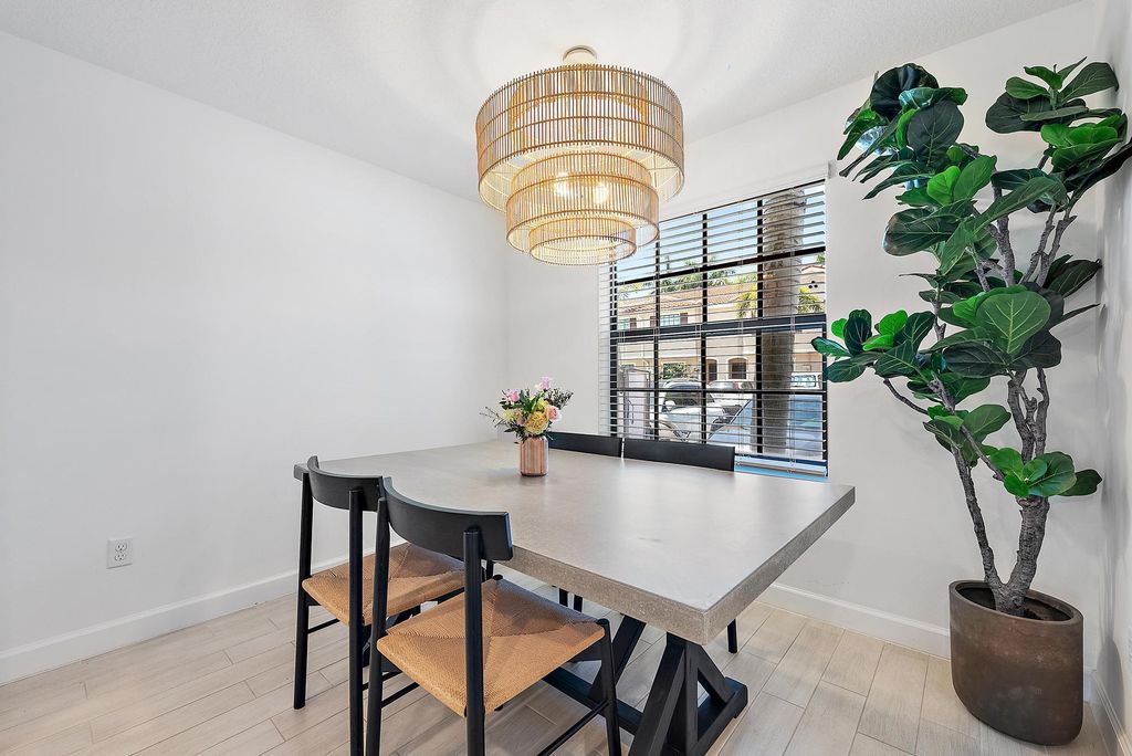 Photo of 5050 Genove Place, Riviera Beach, FL 33410 (MLS # R11093279)