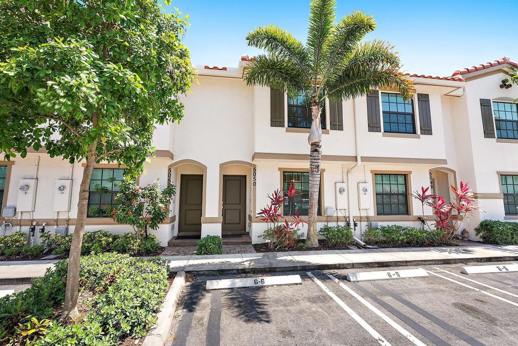 Photo of 5050 Genove Place, Riviera Beach, FL 33410 (MLS # R11093279)