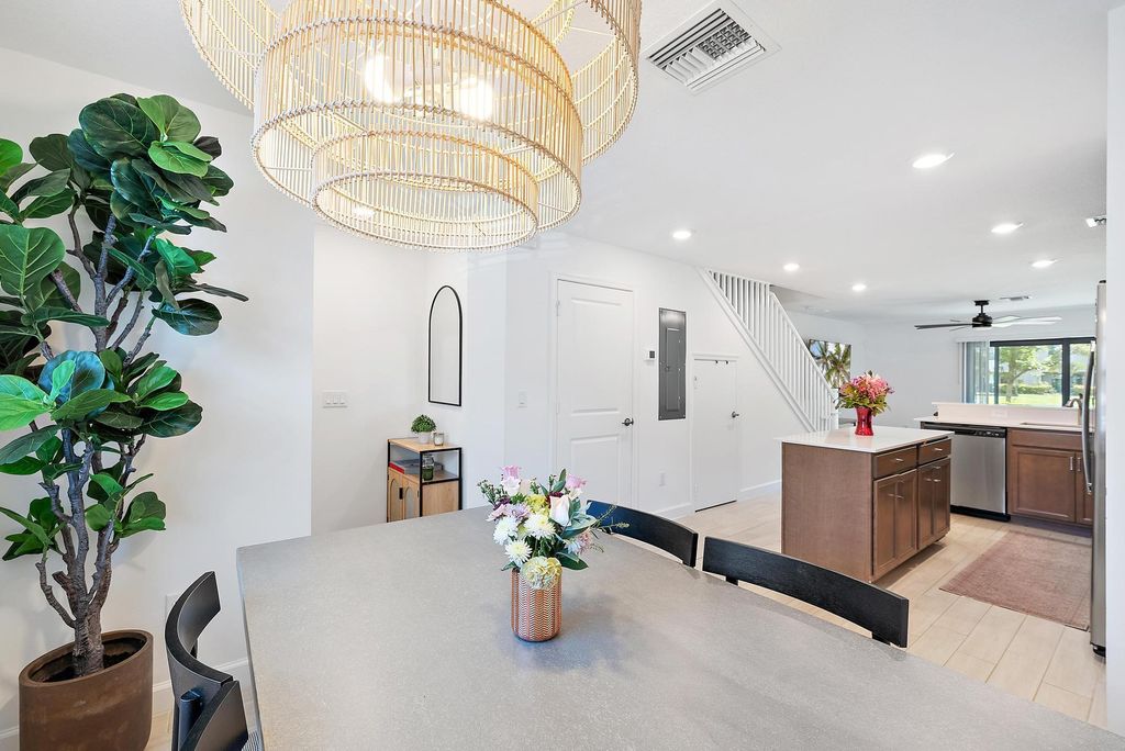 Photo of 5050 Genove Place, Riviera Beach, FL 33410 (MLS # R11093279)