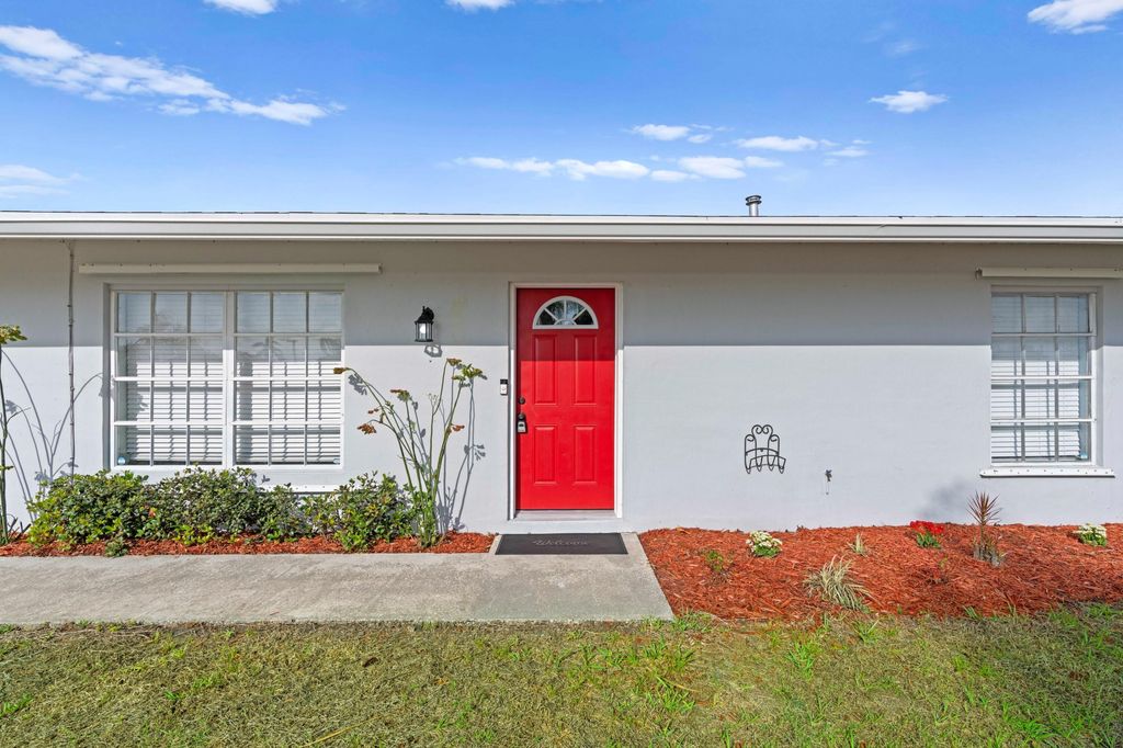 Photo of 850 SW Goodrich Street, Port Saint Lucie, FL 34983 (MLS # B26003772)
