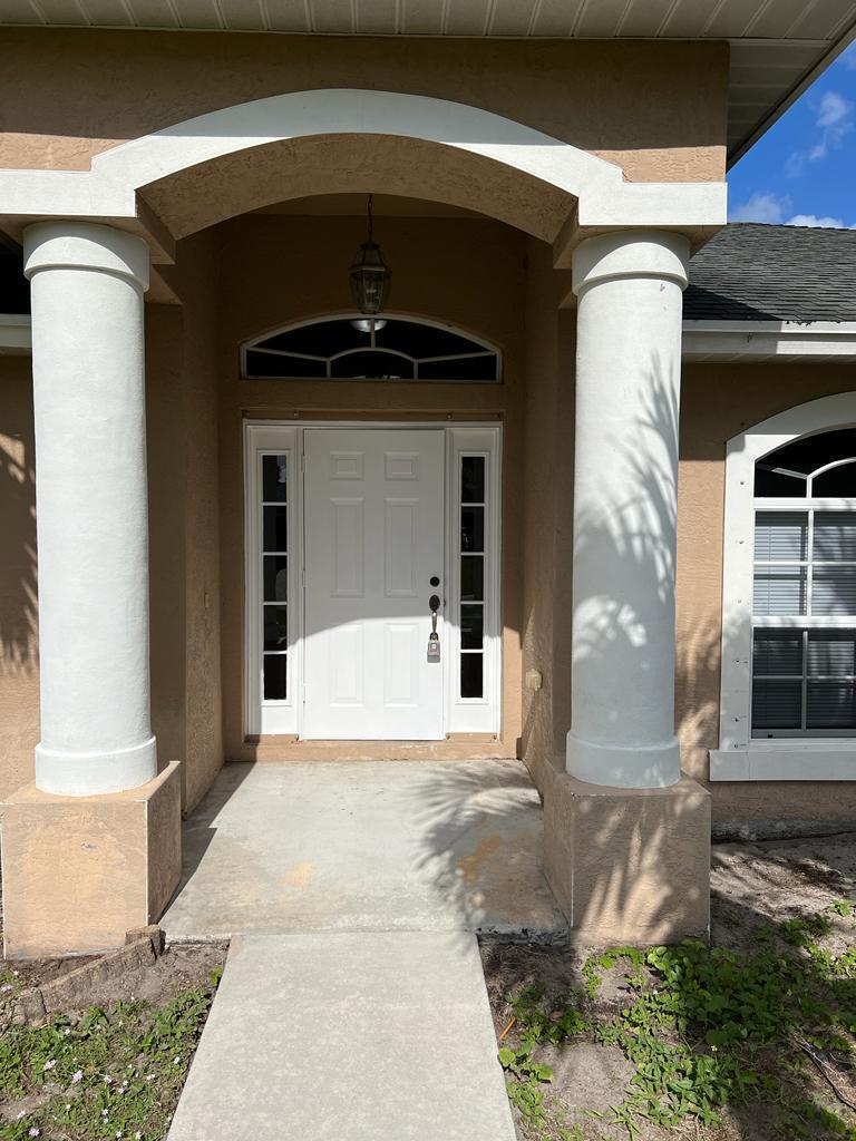 Photo of 1843 SW Altman Avenue, Port Saint Lucie, FL 34953 (MLS # R11015159)